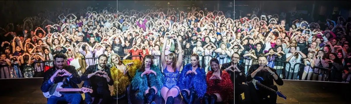 Lover: An Eras Tour Experience on stage in front of a sold-out crowd